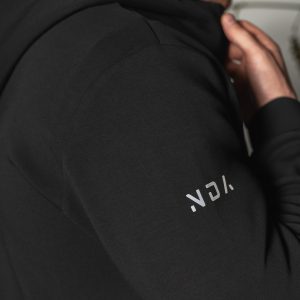 Deluxe Men’s Hoodie (Black), crafted with our exclusive deluxe material for a truly luxurious and functional experience. This ultra modern hoodie is designed to elevate your style and provide ultimate comfort. Our deluxe material has a unique scuba-like texture that will make you stand out from the crowd.