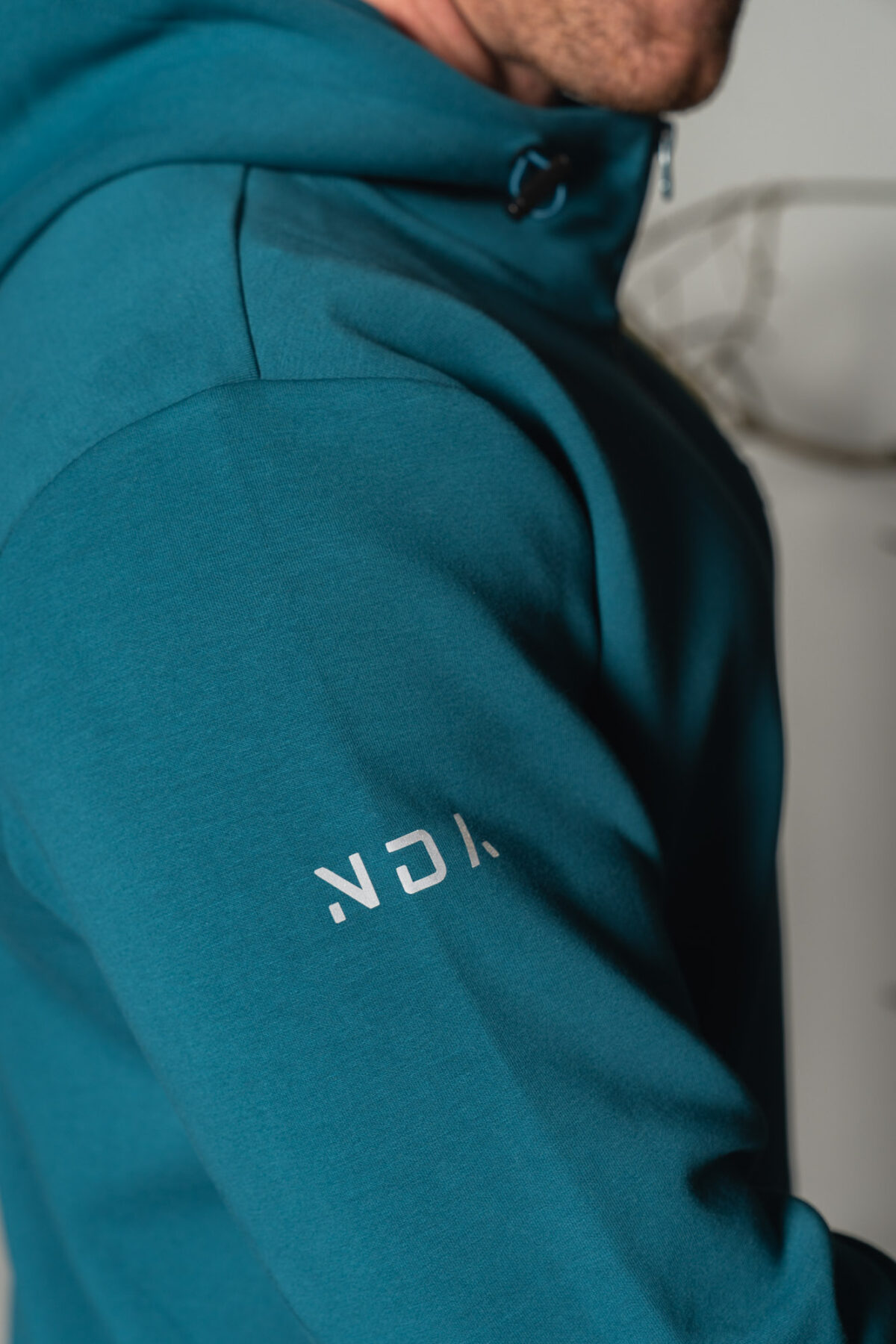 Deluxe Men’s Hoodie (Dark Teal), crafted with our exclusive deluxe material for a truly luxurious and functional experience. This ultra modern hoodie is designed to elevate your style and provide ultimate comfort. Our deluxe material has a unique scuba-like texture that will make you stand out from the crowd.