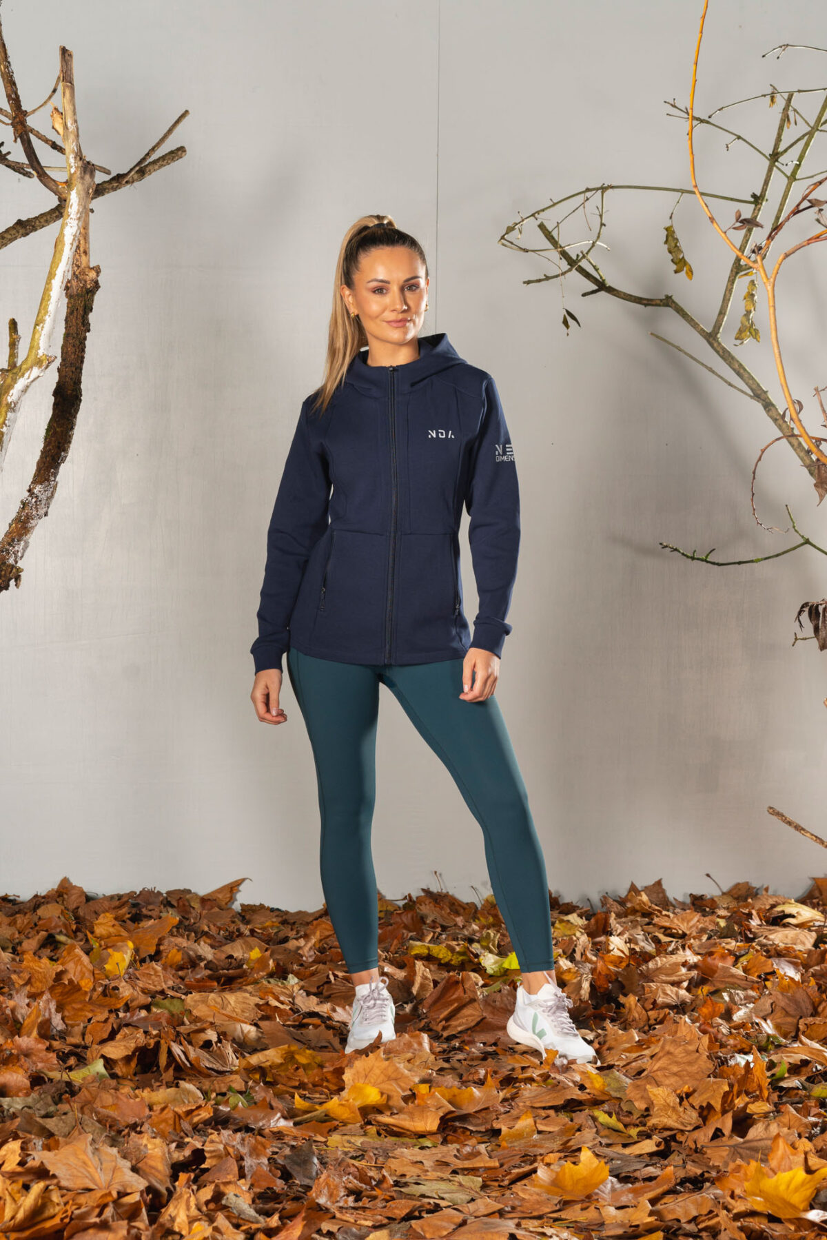 Deluxe Refined Hoodie (Navy), the ultimate combination of style and functionality. This shape-enhancing full zip hoodie is the perfect layering piece for any occasion.