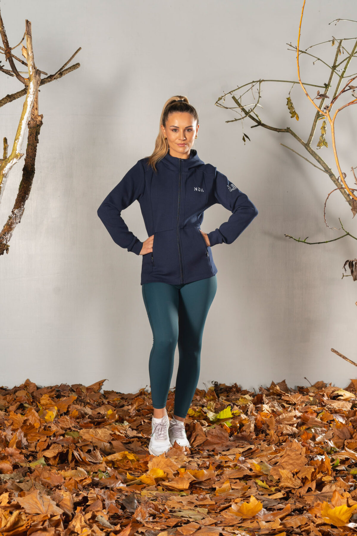 Deluxe Refined Hoodie (Navy), the ultimate combination of style and functionality. This shape-enhancing full zip hoodie is the perfect layering piece for any occasion.