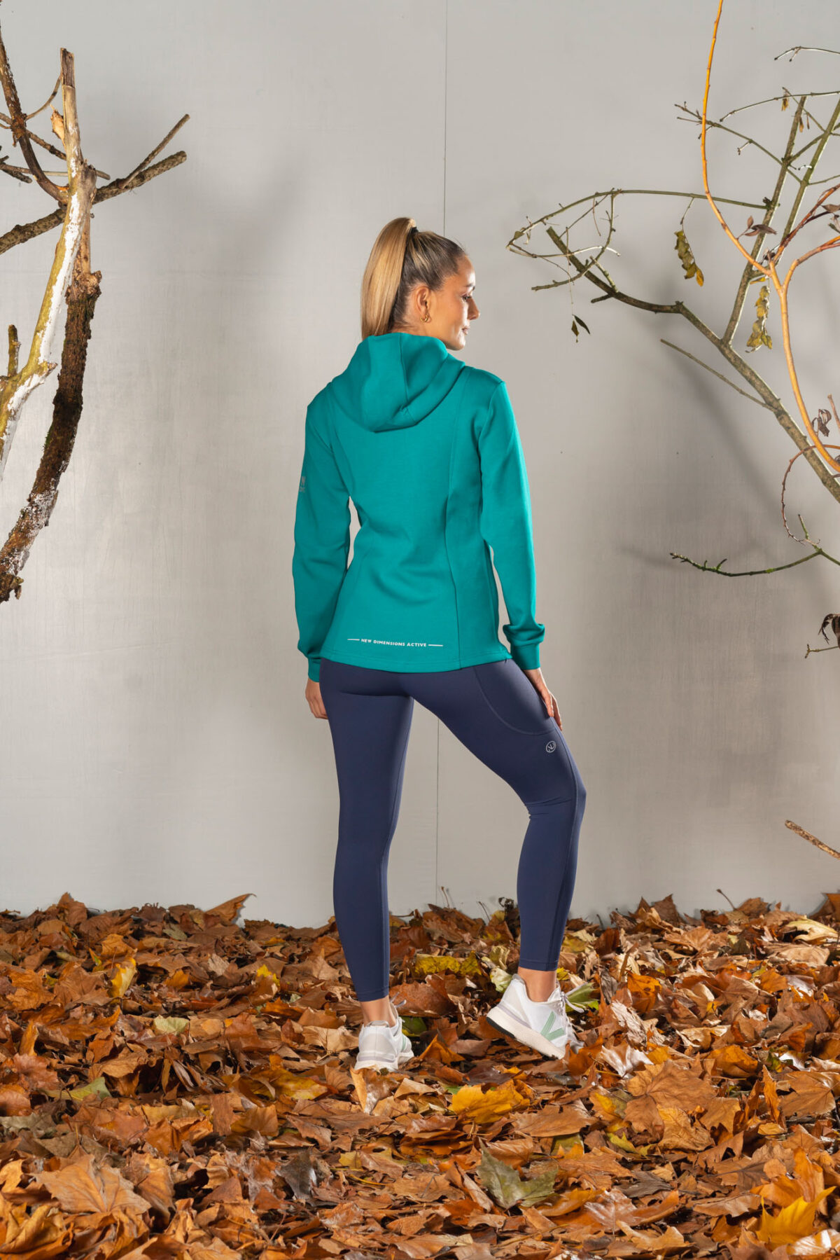 Deluxe Refined Hoodie (Teal), the ultimate combination of style and functionality. This shape-enhancing full zip hoodie is the perfect layering piece for any occasion.