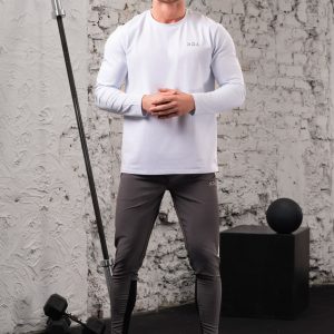 The Benchmark Long Sleeve (White) is perfect for any activity. Whether you’re running, working out, or just lounging around, this shirt will keep you comfortable and looking great. The cotton blend material is lightweight and breathable, so you won’t have to worry about overheating. Additionally, the 8 way stretch material allows you to move freely without feeling restricted.