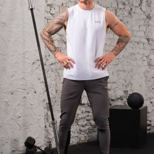 The Benchmark Tank Top (White) is designed to keep you cool and comfortable in any situation. The cotton blend material is soft and breathable, allowing air to circulate freely and keeping you cool. The stretch in the material ensures you can move without feeling restricted. The sleeveless design and high neckline give you a stylish look, while the lightweight material won’t weigh you down.
