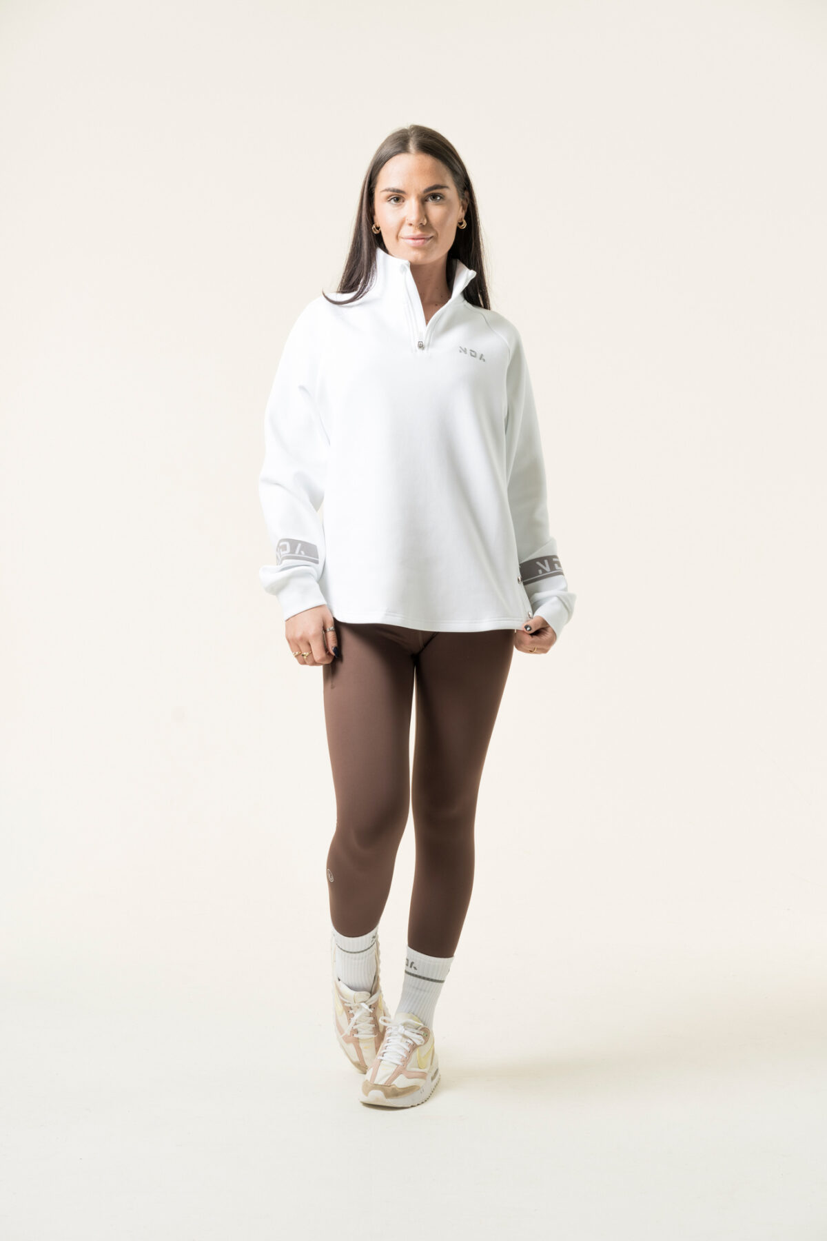 Premium & Practical - the Deluxe ¼ Zip (White). Made from our deluxe material, this 1/4 zip is designed to keep you warm and cosy during the colder months. The fabric is soft & heavy to the touch and provides ultimate comfort, making it a must-have for your wardrobe.