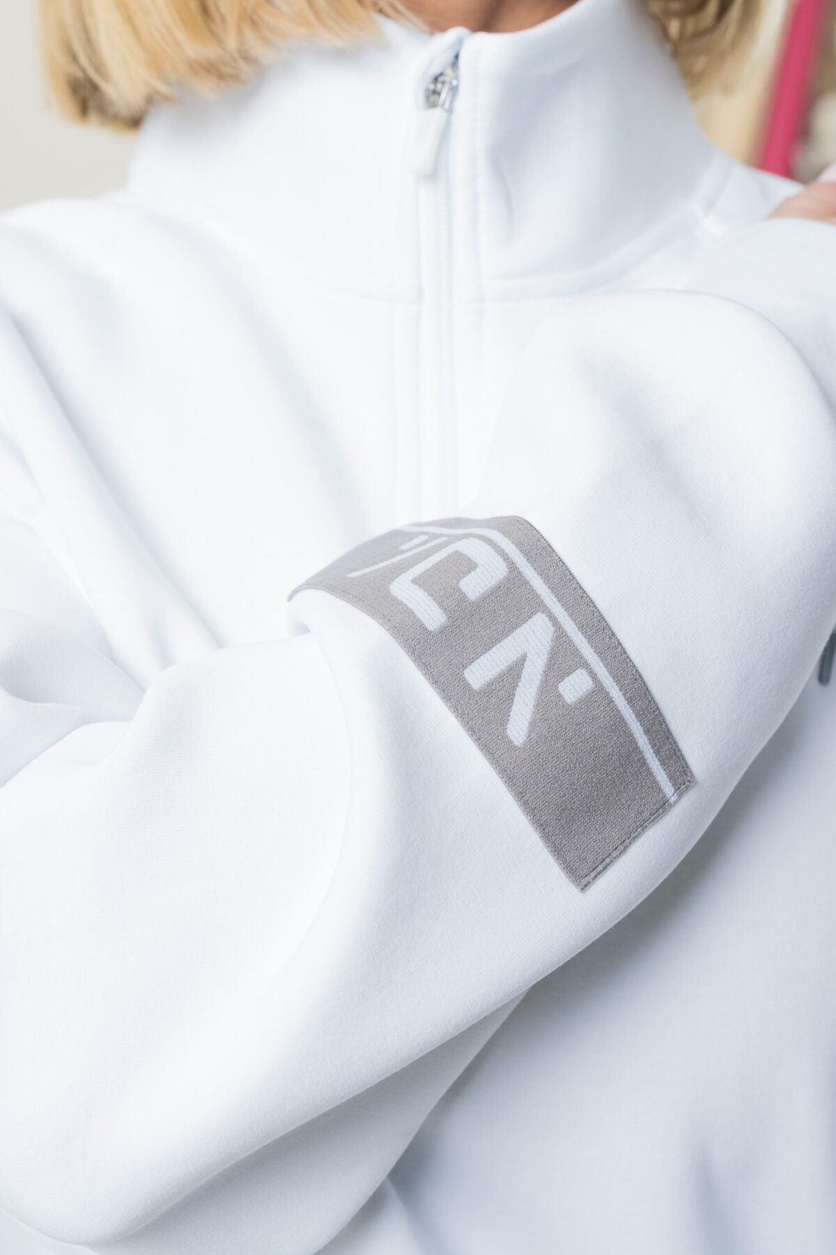 Premium & Practical - the Deluxe ¼ Zip (White). Made from our deluxe material, this 1/4 zip is designed to keep you warm and cosy during the colder months. The fabric is soft & heavy to the touch and provides ultimate comfort, making it a must-have for your wardrobe.