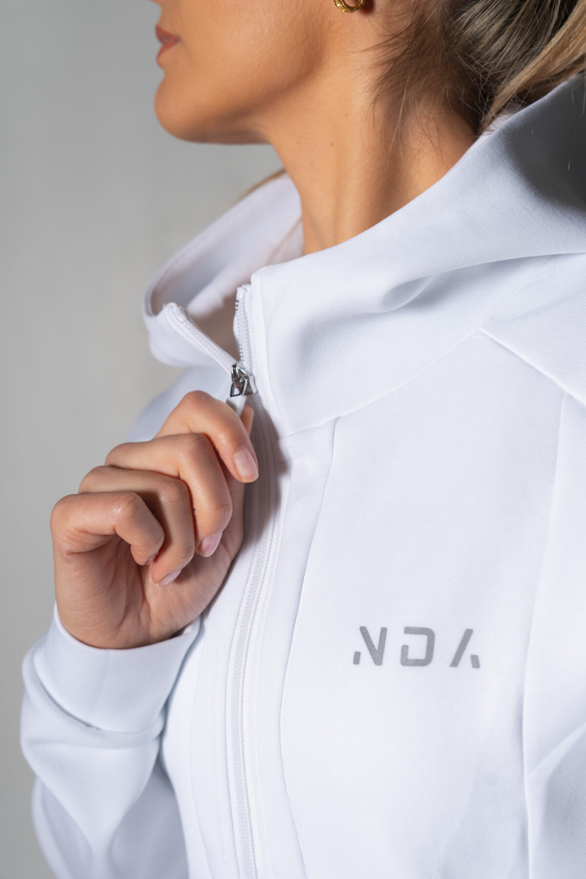 Deluxe Refined Hoodie (White), the ultimate combination of style and functionality. This shape-enhancing full zip hoodie is the perfect layering piece for any occasion.