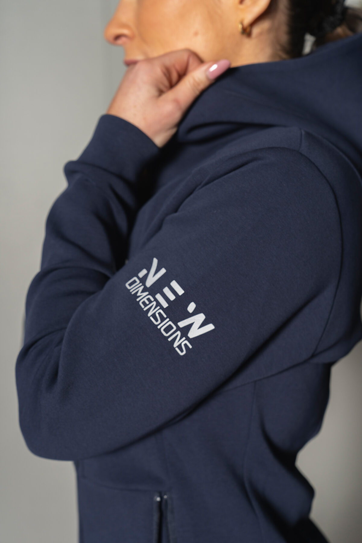 Deluxe Refined Hoodie (Navy), the ultimate combination of style and functionality. This shape-enhancing full zip hoodie is the perfect layering piece for any occasion.