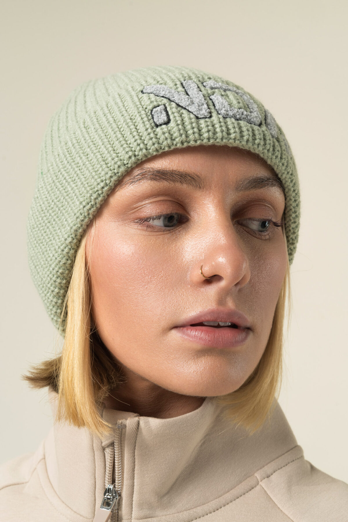 Stay warm while you are on the move in our new ribbed knit beanie. The soft knit feel gives you that extra cosy comfort. An embroidered flock NDA logo also gives you a touch of subtle style.