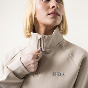 Premium & Practical - the Deluxe ¼ Zip (Beige). Made from our deluxe material, this 1/4 zip is designed to keep you warm and cosy during the colder months. The fabric is soft & heavy to the touch and provides ultimate comfort, making it a must-have for your wardrobe.