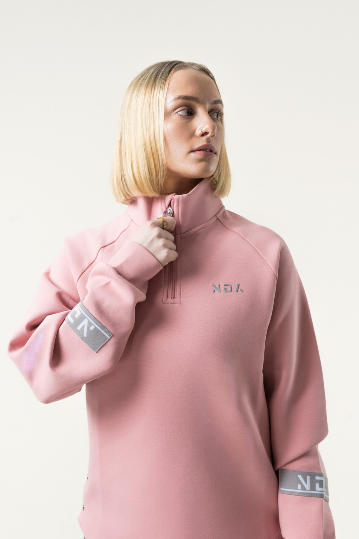 Premium & Practical - the Deluxe ¼ Zip (Blush Pink). Made from our deluxe material, this 1/4 zip is designed to keep you warm and cosy during the colder months. The fabric is soft & heavy to the touch and provides ultimate comfort, making it a must-have for your wardrobe.