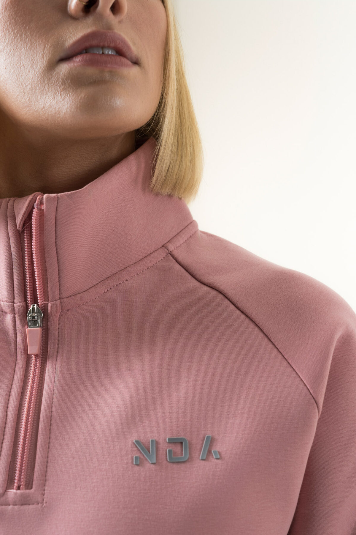 Premium & Practical - the Deluxe ¼ Zip (Blush Pink). Made from our deluxe material, this 1/4 zip is designed to keep you warm and cosy during the colder months. The fabric is soft & heavy to the touch and provides ultimate comfort, making it a must-have for your wardrobe.