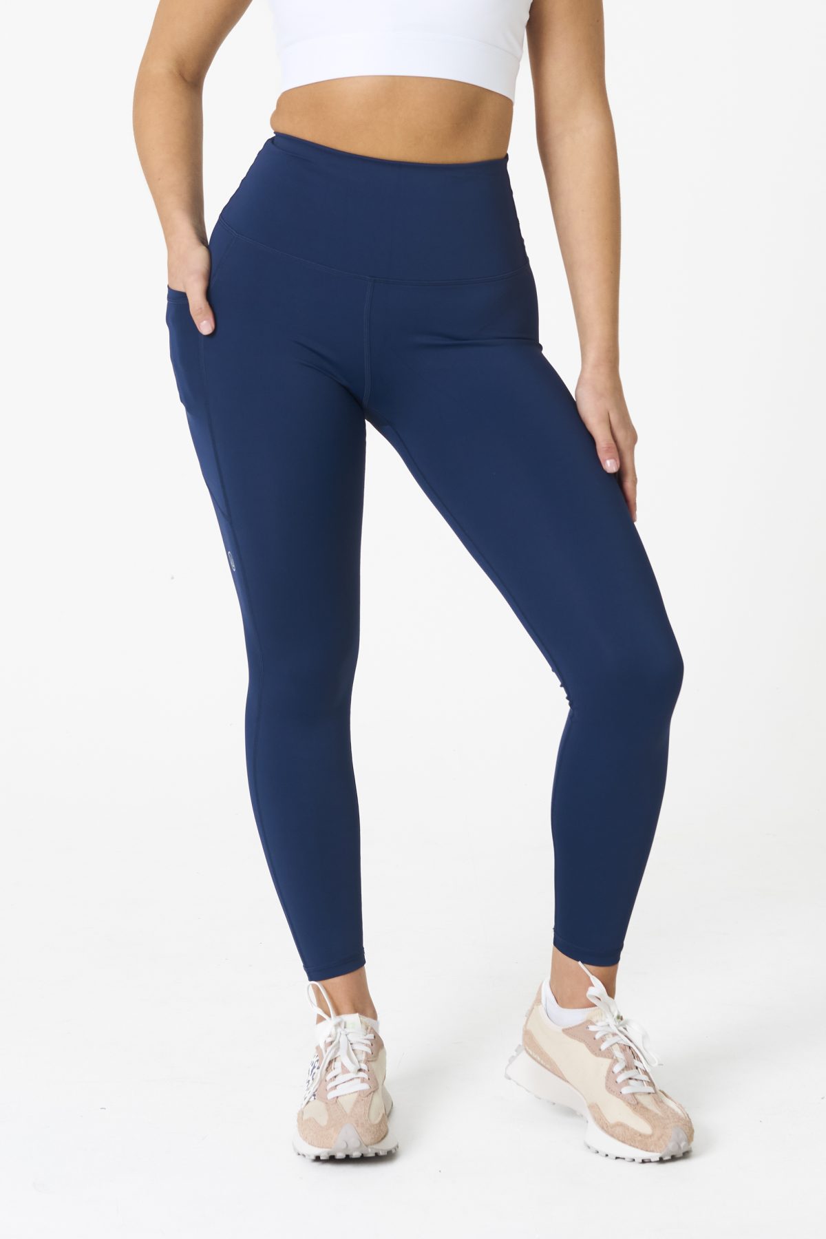 Introducing our all-new Compression 4.0 Legging (Navy) - the upgraded version of our best-selling Compression 3.0 with an exciting addition of an enhanced back detail! Designed to elevate your workout experience, these leggings offer the same incredible features you know and love, with some added enhancements.