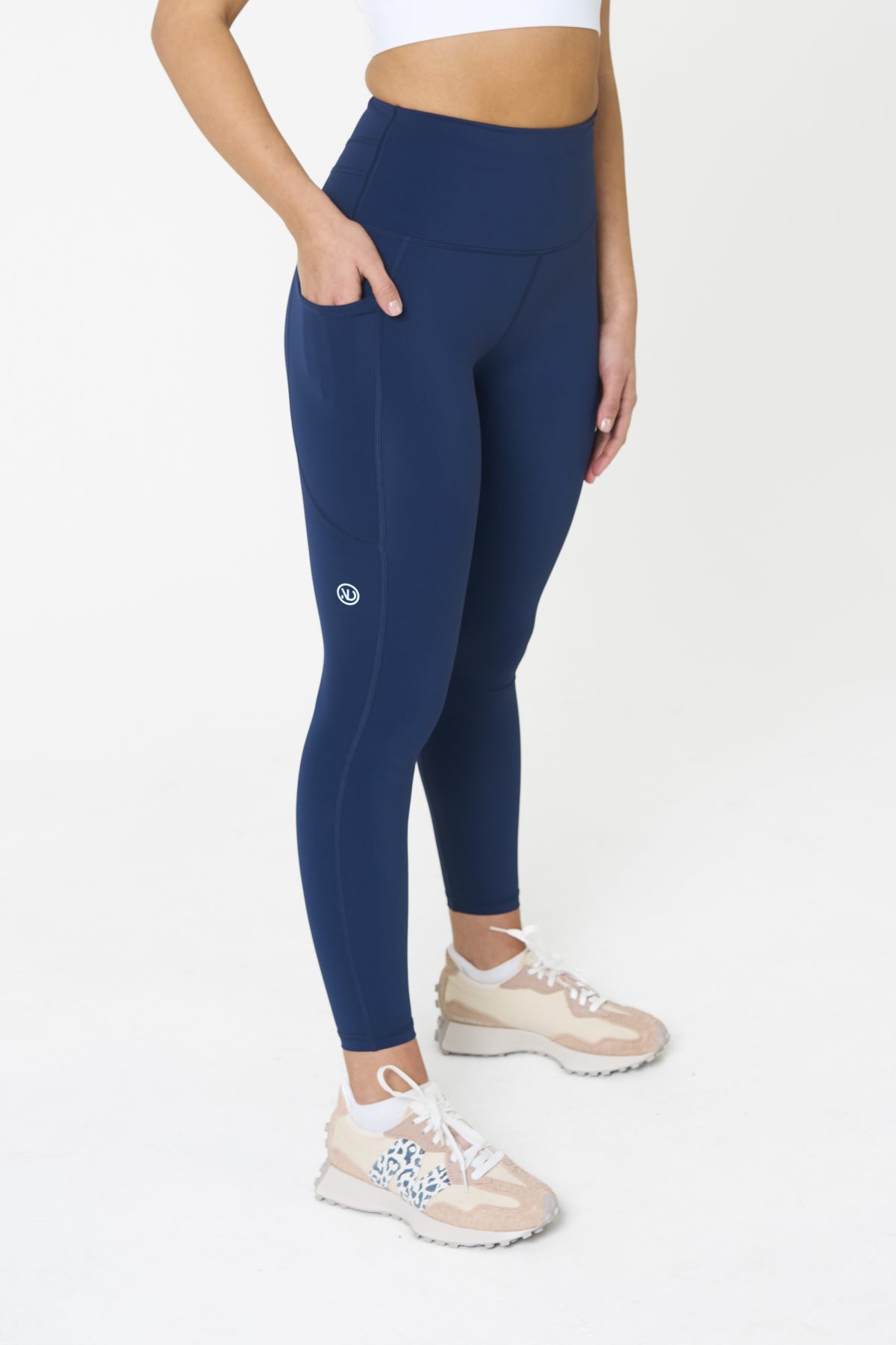 Introducing our all-new Compression 4.0 Legging (Navy) - the upgraded version of our best-selling Compression 3.0 with an exciting addition of an enhanced back detail! Designed to elevate your workout experience, these leggings offer the same incredible features you know and love, with some added enhancements.