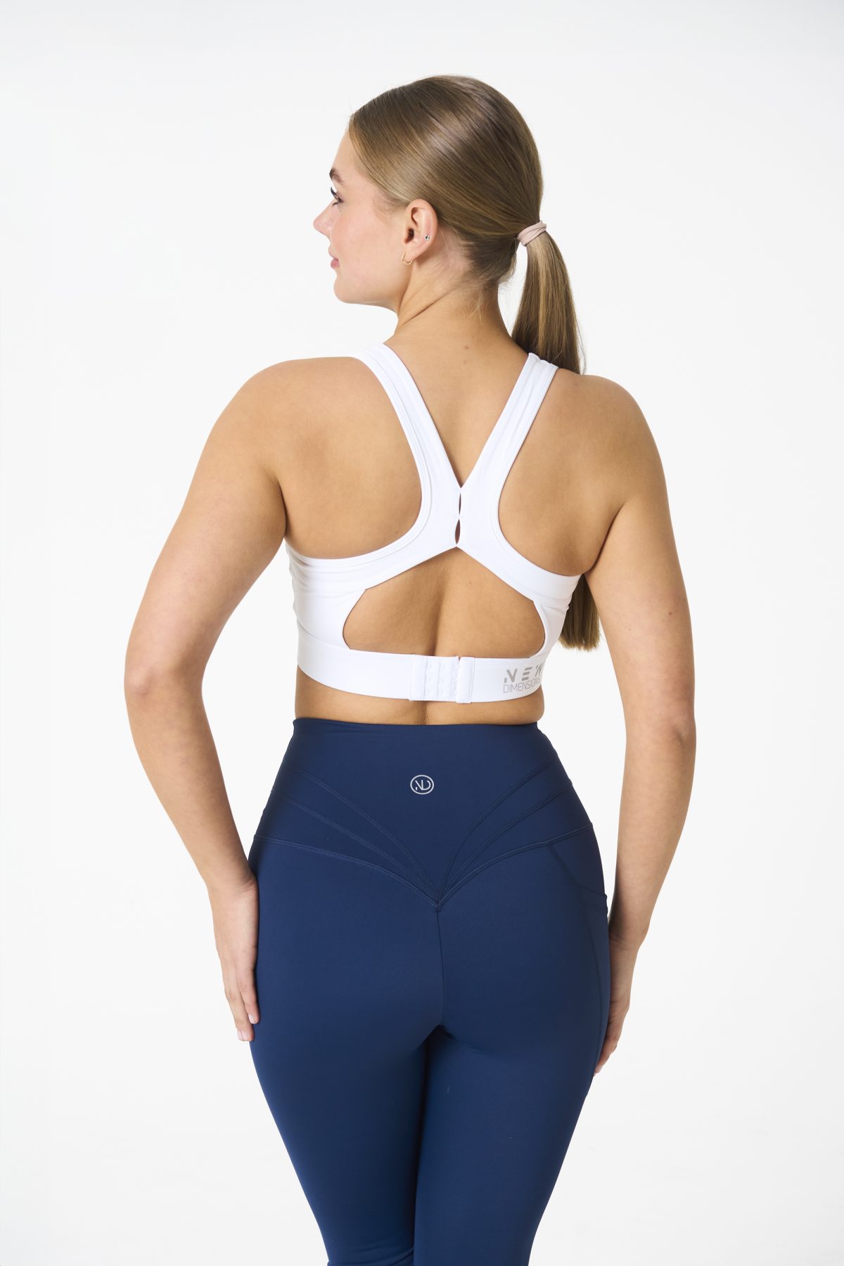 Introducing our all-new Compression 4.0 Legging (Navy) - the upgraded version of our best-selling Compression 3.0 with an exciting addition of an enhanced back detail! Designed to elevate your workout experience, these leggings offer the same incredible features you know and love, with some added enhancements.