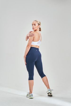 Introducing our Rise High Waisted ¾ Legging (Navy), the ultimate combination of style and functionality for your spring/summer wardrobe. These leggings feature a flattering high-waisted design that offers both support and comfort during your workouts. The ¾ length is perfect for warmer weather, allowing you to stay cool and stylish no matter the activity.