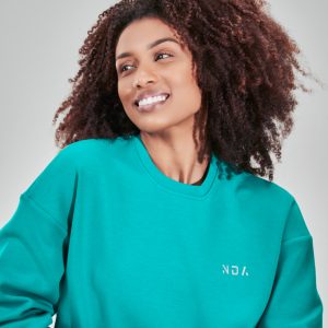 Premium & Practical – Deluxe Oversize Sweater (Teal). Made from our deluxe material, this sweater is designed to keep you cool and cosy during this season. The fabric is soft & heavy to the touch and provides ultimate comfort, making it a must-have for your wardrobe.