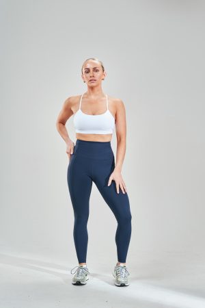 Introducing our Rise High Waisted Legging (Navy), the perfect addition to your activewear collection for the upcoming Spring/Summer season. These leggings are designed with two side pockets, allowing you to carry your essentials such as your phone, keys, or cards with you wherever you go.