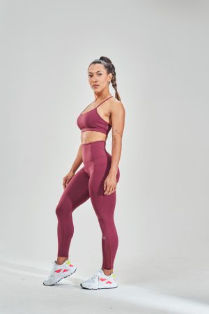 Introducing our Rise High Waisted Legging (Rose Wood), the perfect addition to your activewear collection for the upcoming Spring/Summer season. These leggings are designed with two side pockets, allowing you to carry your essentials such as your phone, keys, or cards with you wherever you go.