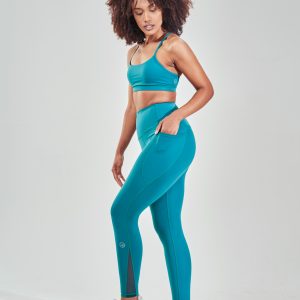 Introducing our Rise High Waisted Legging (Teal), the perfect addition to your activewear collection for the upcoming Spring/Summer season. These leggings are designed with two side pockets, allowing you to carry your essentials such as your phone, keys, or cards with you wherever you go.
