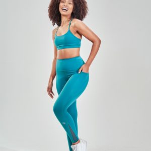 Introducing our Rise High Waisted Legging (Teal), the perfect addition to your activewear collection for the upcoming Spring/Summer season. These leggings are designed with two side pockets, allowing you to carry your essentials such as your phone, keys, or cards with you wherever you go.