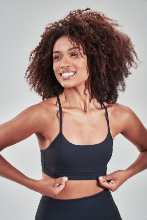 Introducing our Rise Sports Bra (Black) from the Spring Summer Collection, featuring a sleek design with removable pads for customizable support. The trend mesh detail on the back not only adds a stylish touch but also enhances breathability, keeping you cool and comfortable during workouts.
