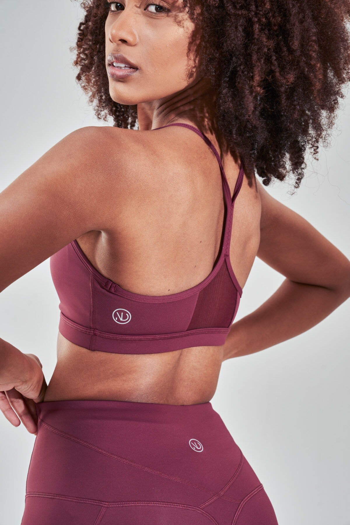 Introducing our Rise Sports Bra (Rose Wood) from the Spring Summer Collection, featuring a sleek design with removable pads for customizable support. The trend mesh detail on the back not only adds a stylish touch but also enhances breathability, keeping you cool and comfortable during workouts.