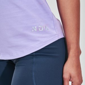 Elevate your athletic wardrobe with the Rise T-Shirt (Lavender). Crafted from a blend of 95% Cotton and 5% Spandex, this t-shirt offers a comfortable and stretchy fit that moves with you during any activity. The reflective logo adds a touch of style and visibility, perfect for outdoor workouts or runs in low light conditions.
