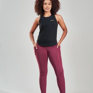 Introducing the Rise Vest Top (Black), a must-have addition to your activewear collection. Crafted with a blend of 95% Cotton and 5% Spandex, this top offers a perfect balance of comfort and stretch for your active lifestyle.