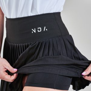 Elevate your wardrobe with our stunning Silhouette Skirt (Black), a must-have piece for any fashion-forward individual. Crafted from a luxurious blend of 90% Polyester and 10% Spandex, this skirt is not only soft and comfortable but also offers a flattering stretch for a perfect fit.