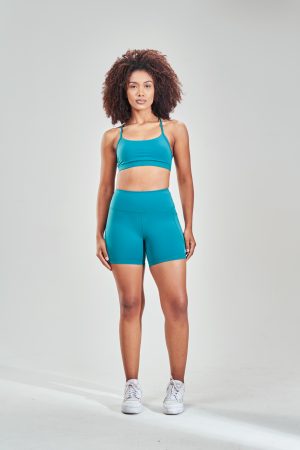 Introducing our Rise 5 inch Shorts (Teal), the perfect blend of style and functionality for all your active needs. Crafted with a comfortable and stretchy fabric, these shorts are designed to move with you during your workout or outdoor adventures.