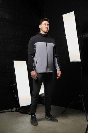 Elevate your activewear wardrobe with our latest addition: the Hybrid Zip Jacket (Black). Part of the prestigious  Collection, this men's jacket is designed for performance and style. Crafted from lightweight material, it offers an exceptional combination of comfort and functionality, perfect for any activity or casual wear.