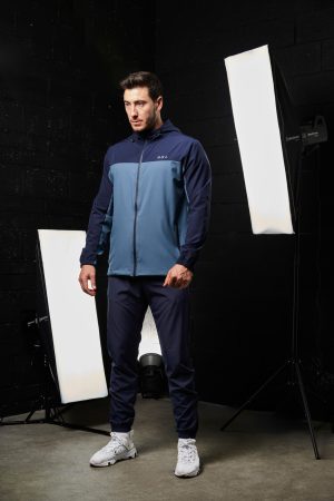 Elevate your activewear wardrobe with our latest addition: the Hybrid Zip Jacket (Navy). Part of the prestigious  Collection, this men's jacket is designed for performance and style. Crafted from lightweight material, it offers an exceptional combination of comfort and functionality, perfect for any activity or casual wear.