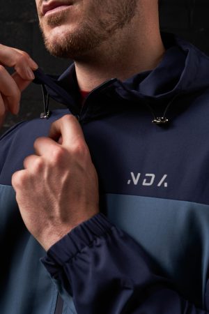 Elevate your activewear wardrobe with our latest addition: the Hybrid Zip Jacket (Navy). Part of the prestigious  Collection, this men's jacket is designed for performance and style. Crafted from lightweight material, it offers an exceptional combination of comfort and functionality, perfect for any activity or casual wear.