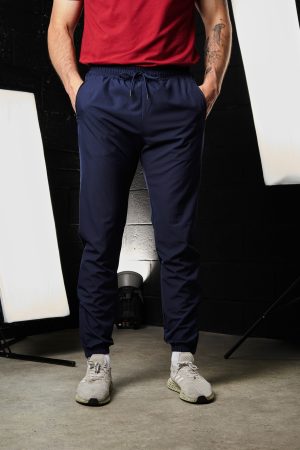Introducing the Hybrid Jogger (Navy), the latest addition to our Men's Collection. Designed for the modern, active man, these joggers are perfect for any sport or activity, especially on warm days. Crafted from lightweight, breathable fabric, they ensure you stay cool and comfortable, no matter how intense your workout gets.