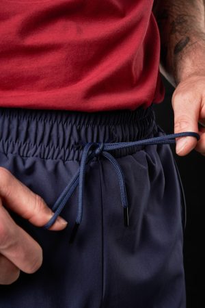 Introducing the Hybrid Jogger (Navy), the latest addition to our Men's Collection. Designed for the modern, active man, these joggers are perfect for any sport or activity, especially on warm days. Crafted from lightweight, breathable fabric, they ensure you stay cool and comfortable, no matter how intense your workout gets.