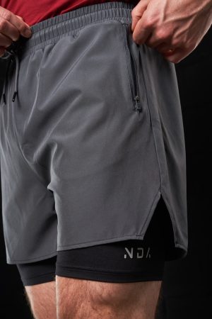 Introducing the Hybrid Shorts (Grey), the ultimate fusion of style, comfort, and performance. Engineered for versatility, these lightweight shorts are designed to meet the demands of your active lifestyle. Featuring a unique two-layer construction, the Hybrid Shorts combine a loose-flowing outer layer with a supportive bike short underneath, ensuring you stay comfortable and unrestricted during any activity.