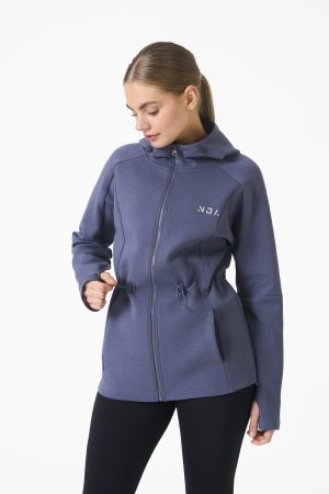 Elevate your activewear game with the Legacy Zip Hoodie (Dark Steel) from our Legacy Activewear Collection. Designed for ultimate movement, support, and comfort, this hoodie seamlessly blends practicality with style. The full-zip closure offers effortless wearability, while the adjustable hood and elasticated waist ensure a personalized fit. Perfect for your on-the-go lifestyle, it features two convenient pockets: a secure zipped pocket for essentials and a classic open pocket for quick access. The Legacy Zip Hoodie is your go-to for both functionality and trend-forward fashion.