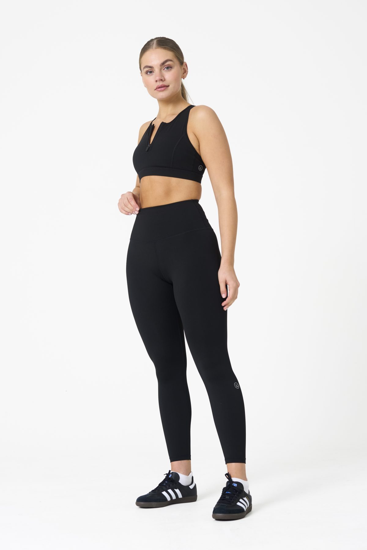 Elevate your workout wardrobe with the Legacy Legging (Black), designed to empower every movement. Part of our Legacy Activewear Collection, these leggings combine superior support, unmatched comfort, and timeless style. Featuring a high-waisted fit with a flat-line drawstring for adjustable comfort, these leggings are crafted to stay put through every squat, lunge, and stretch. The back-enhanced detail adds a flattering finish, making these leggings a staple for both gym sessions and casual wear.