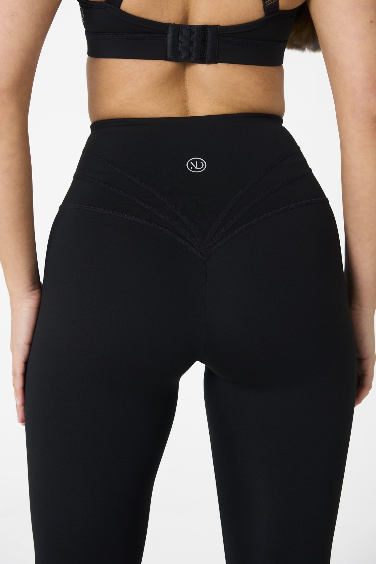 Elevate your workout wardrobe with the Legacy Legging (Black), designed to empower every movement. Part of our Legacy Activewear Collection, these leggings combine superior support, unmatched comfort, and timeless style. Featuring a high-waisted fit with a flat-line drawstring for adjustable comfort, these leggings are crafted to stay put through every squat, lunge, and stretch. The back-enhanced detail adds a flattering finish, making these leggings a staple for both gym sessions and casual wear.