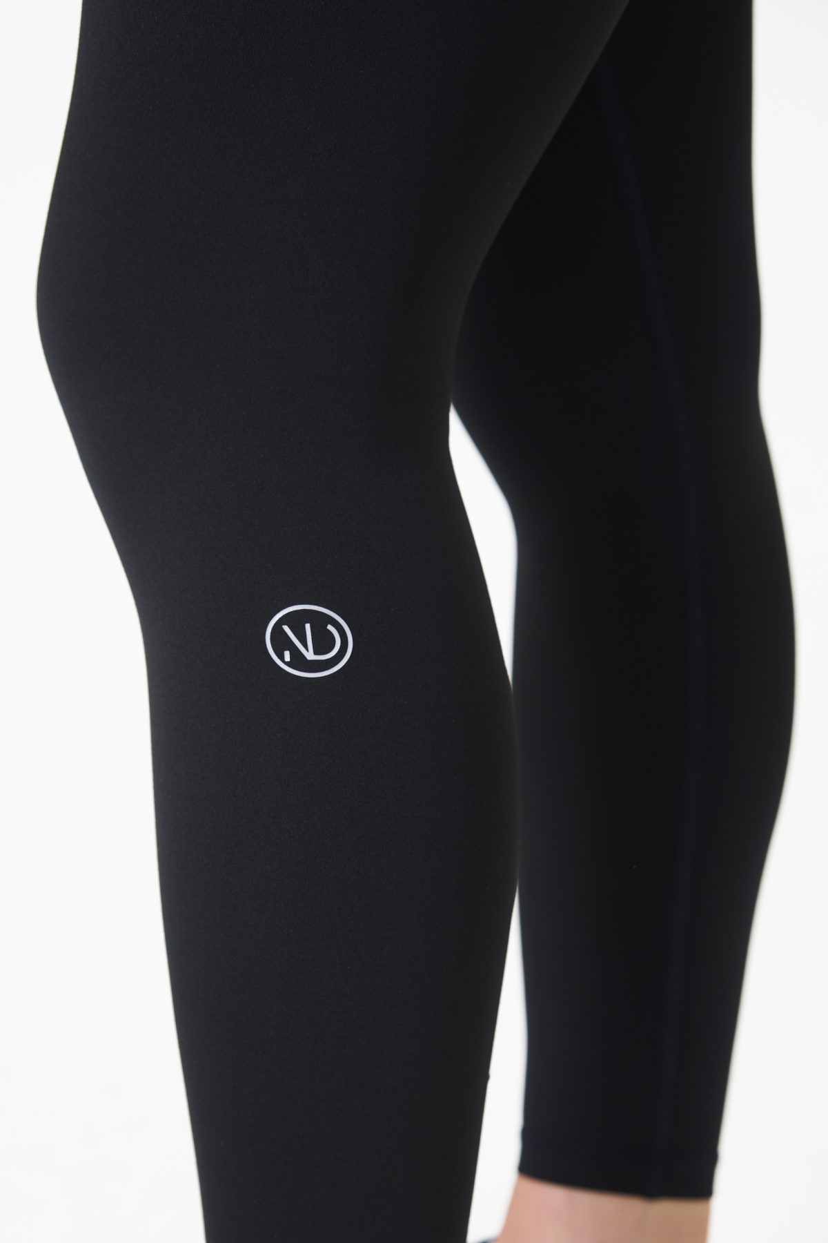 Elevate your workout wardrobe with the Legacy Legging (Black), designed to empower every movement. Part of our Legacy Activewear Collection, these leggings combine superior support, unmatched comfort, and timeless style. Featuring a high-waisted fit with a flat-line drawstring for adjustable comfort, these leggings are crafted to stay put through every squat, lunge, and stretch. The back-enhanced detail adds a flattering finish, making these leggings a staple for both gym sessions and casual wear.