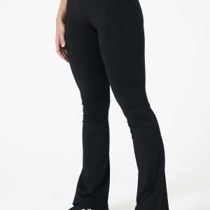 Move freely and confidently with the Legacy Flare Legging (Black), designed for comfort, support, and style. Part of our Legacy Activewear Collection, this legging combines innovative features with a modern flair to elevate your active wardrobe. The high-waisted design ensures a secure fit, while the flatline drawstring offers customizable support for every movement. The subtle back-enhanced detail adds a sculpted, flattering touch. The flare silhouette delivers a trendy yet functional look, giving you ease of movement whether you're in the gym or out and about.