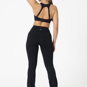 Move freely and confidently with the Legacy Flare Legging (Black), designed for comfort, support, and style. Part of our Legacy Activewear Collection, this legging combines innovative features with a modern flair to elevate your active wardrobe. The high-waisted design ensures a secure fit, while the flatline drawstring offers customizable support for every movement. The subtle back-enhanced detail adds a sculpted, flattering touch. The flare silhouette delivers a trendy yet functional look, giving you ease of movement whether you're in the gym or out and about.