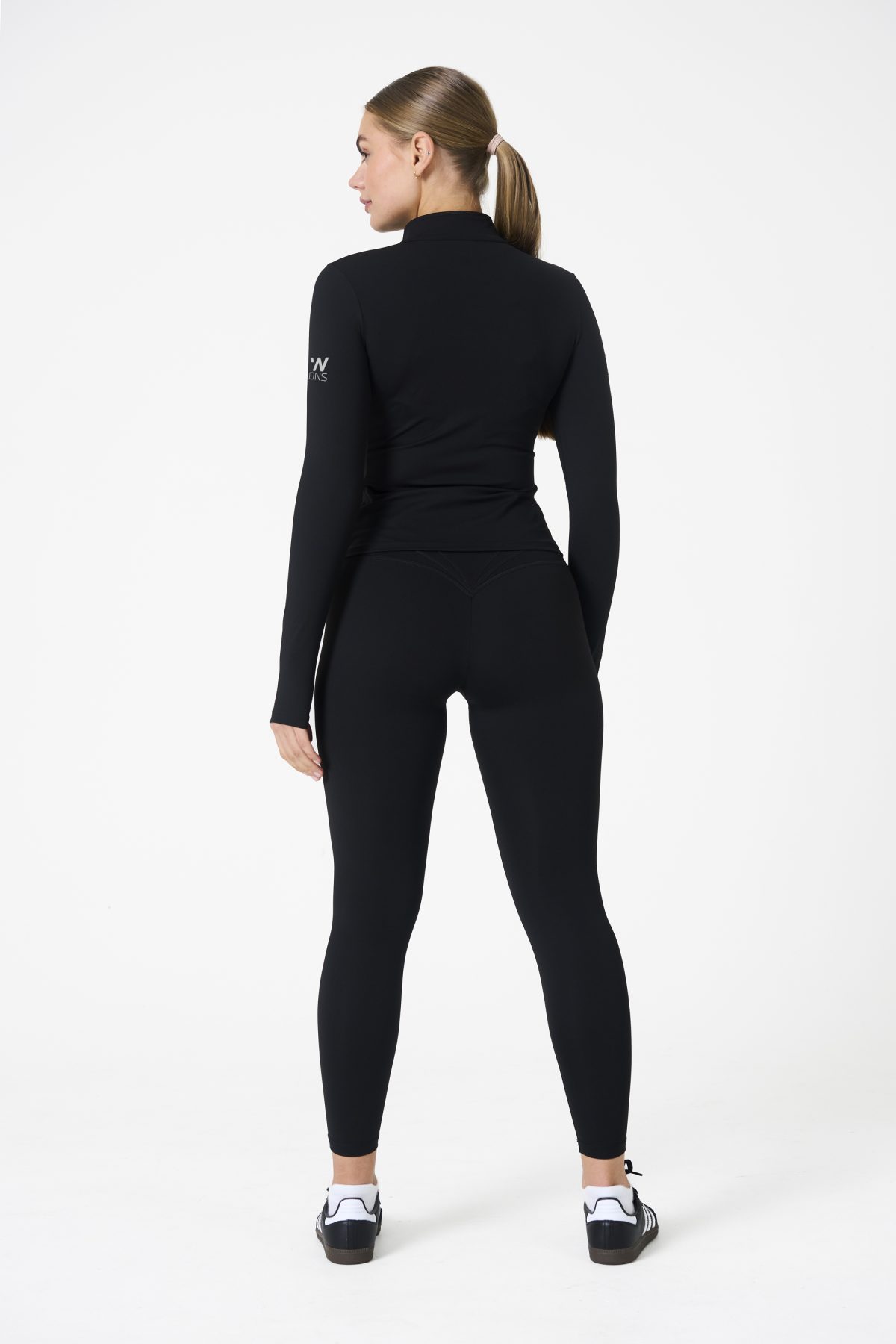 Elevate your activewear game with the Legacy Zip Jacket (Black), designed for those who value movement, support, and unmatched comfort. Crafted from a premium blend of 75% Nylon and 25% Spandex, this jacket offers a lightweight yet durable feel that keeps you supported during any activity.