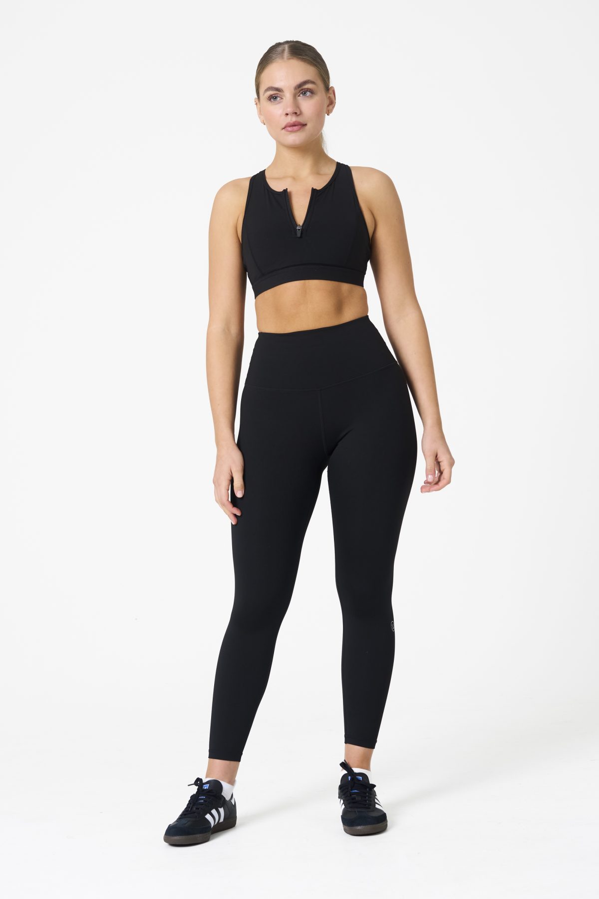 Elevate your workout wardrobe with the Legacy Legging (Black), designed to empower every movement. Part of our Legacy Activewear Collection, these leggings combine superior support, unmatched comfort, and timeless style. Featuring a high-waisted fit with a flat-line drawstring for adjustable comfort, these leggings are crafted to stay put through every squat, lunge, and stretch. The back-enhanced detail adds a flattering finish, making these leggings a staple for both gym sessions and casual wear.