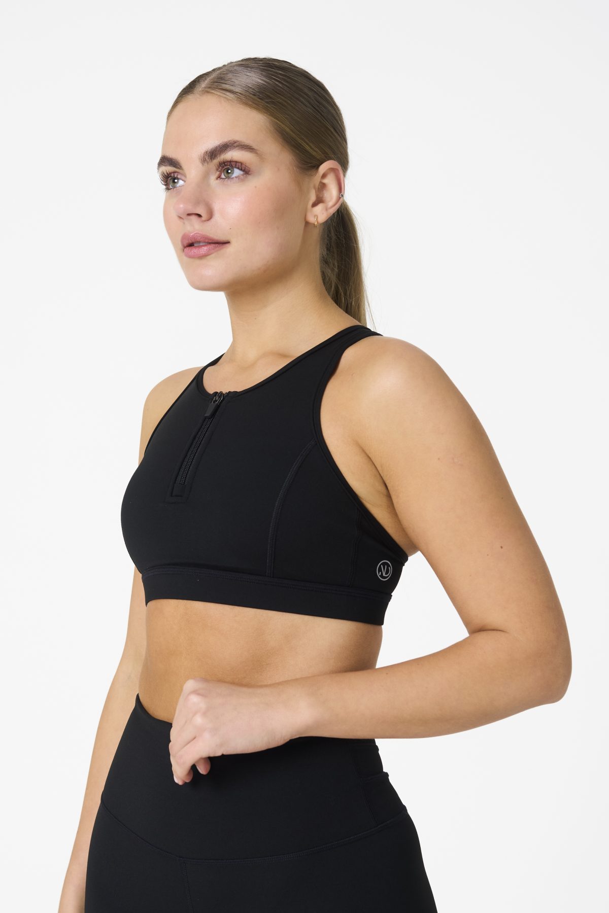 Elevate your workout wardrobe with the Legacy Zip Bra (Black) from our Legacy Activewear Collection. Designed for movement, support, and ultimate comfort, this sports bra combines functionality with trend-forward style.