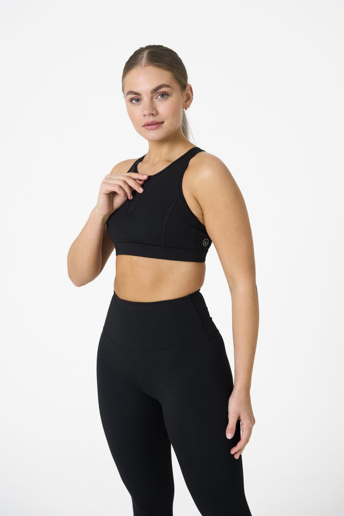 Elevate your workout wardrobe with the Legacy Zip Bra (Black) from our Legacy Activewear Collection. Designed for movement, support, and ultimate comfort, this sports bra combines functionality with trend-forward style.