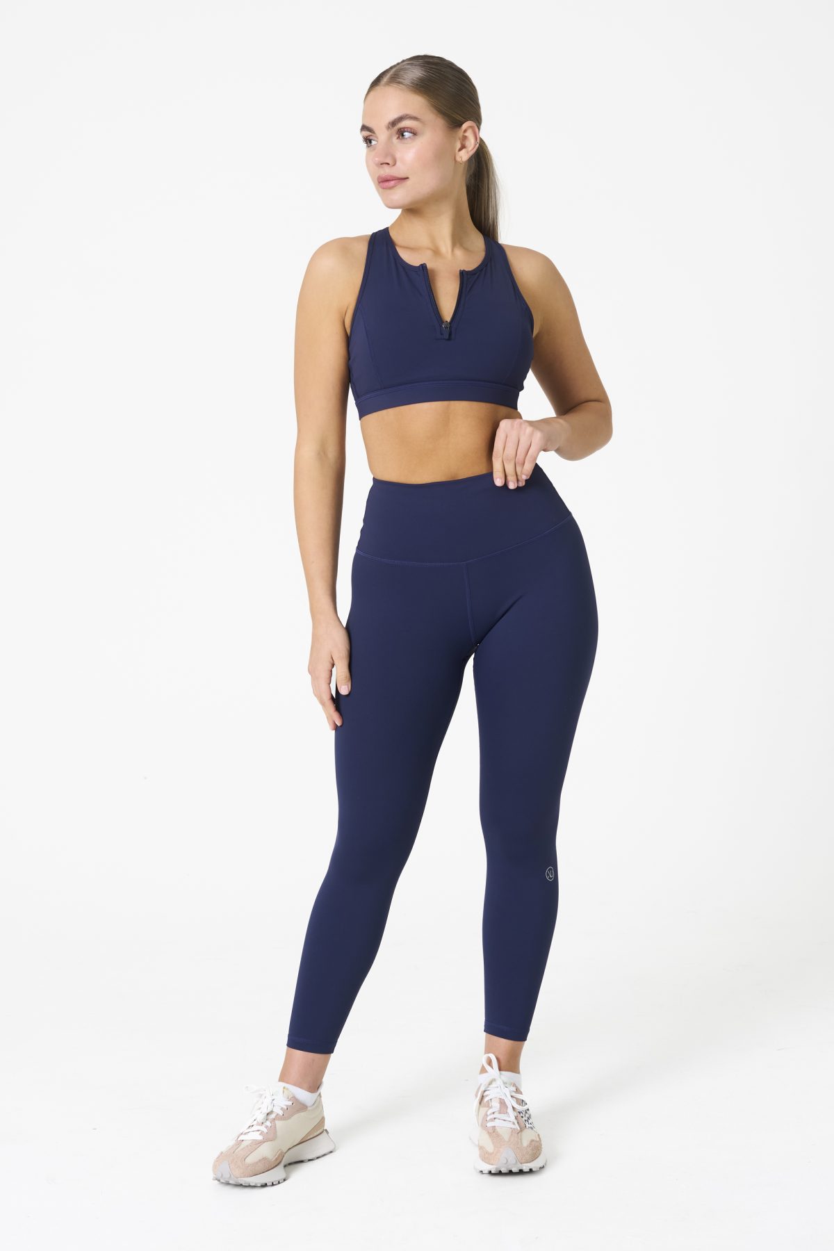 Elevate your workout wardrobe with the Legacy Legging (Navy), designed to empower every movement. Part of our Legacy Activewear Collection, these leggings combine superior support, unmatched comfort, and timeless style. Featuring a high-waisted fit with a flat-line drawstring for adjustable comfort, these leggings are crafted to stay put through every squat, lunge, and stretch. The back-enhanced detail adds a flattering finish, making these leggings a staple for both gym sessions and casual wear.