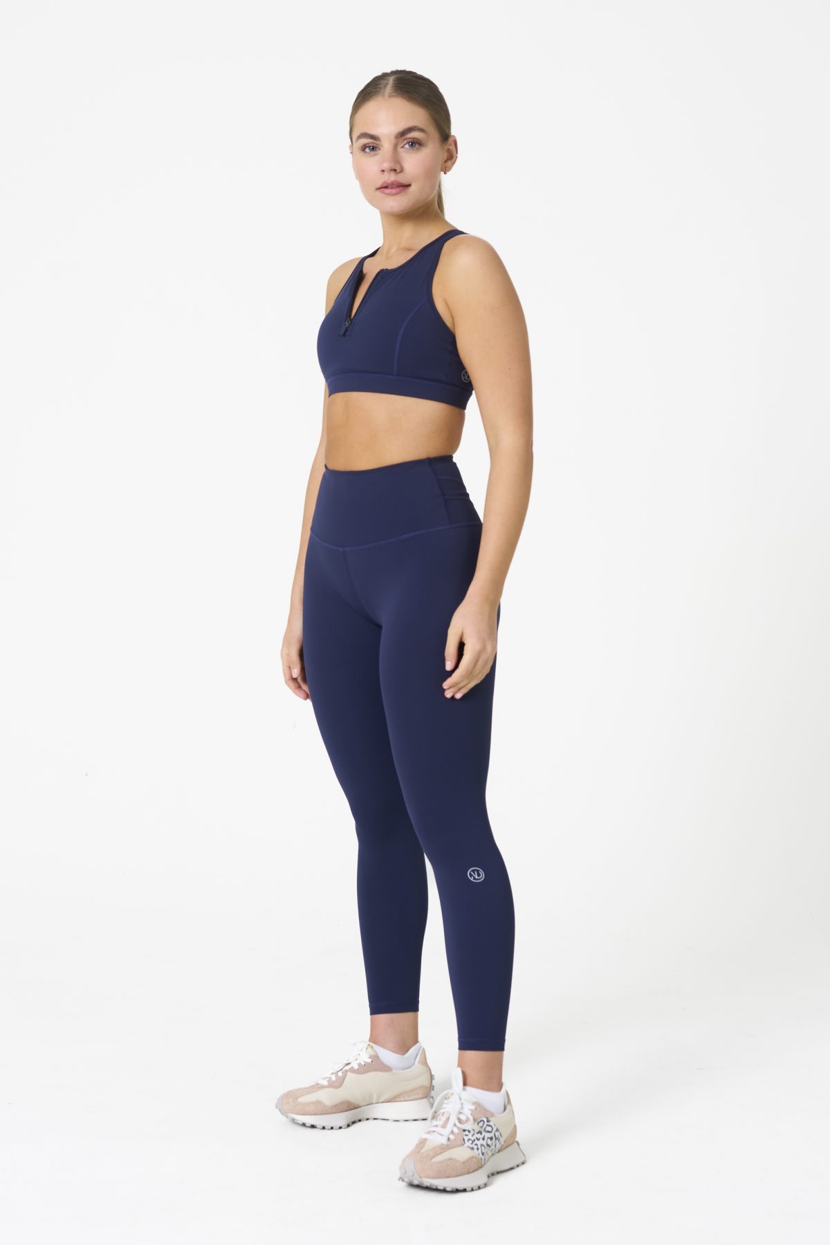 Elevate your workout wardrobe with the Legacy Legging (Navy), designed to empower every movement. Part of our Legacy Activewear Collection, these leggings combine superior support, unmatched comfort, and timeless style. Featuring a high-waisted fit with a flat-line drawstring for adjustable comfort, these leggings are crafted to stay put through every squat, lunge, and stretch. The back-enhanced detail adds a flattering finish, making these leggings a staple for both gym sessions and casual wear.