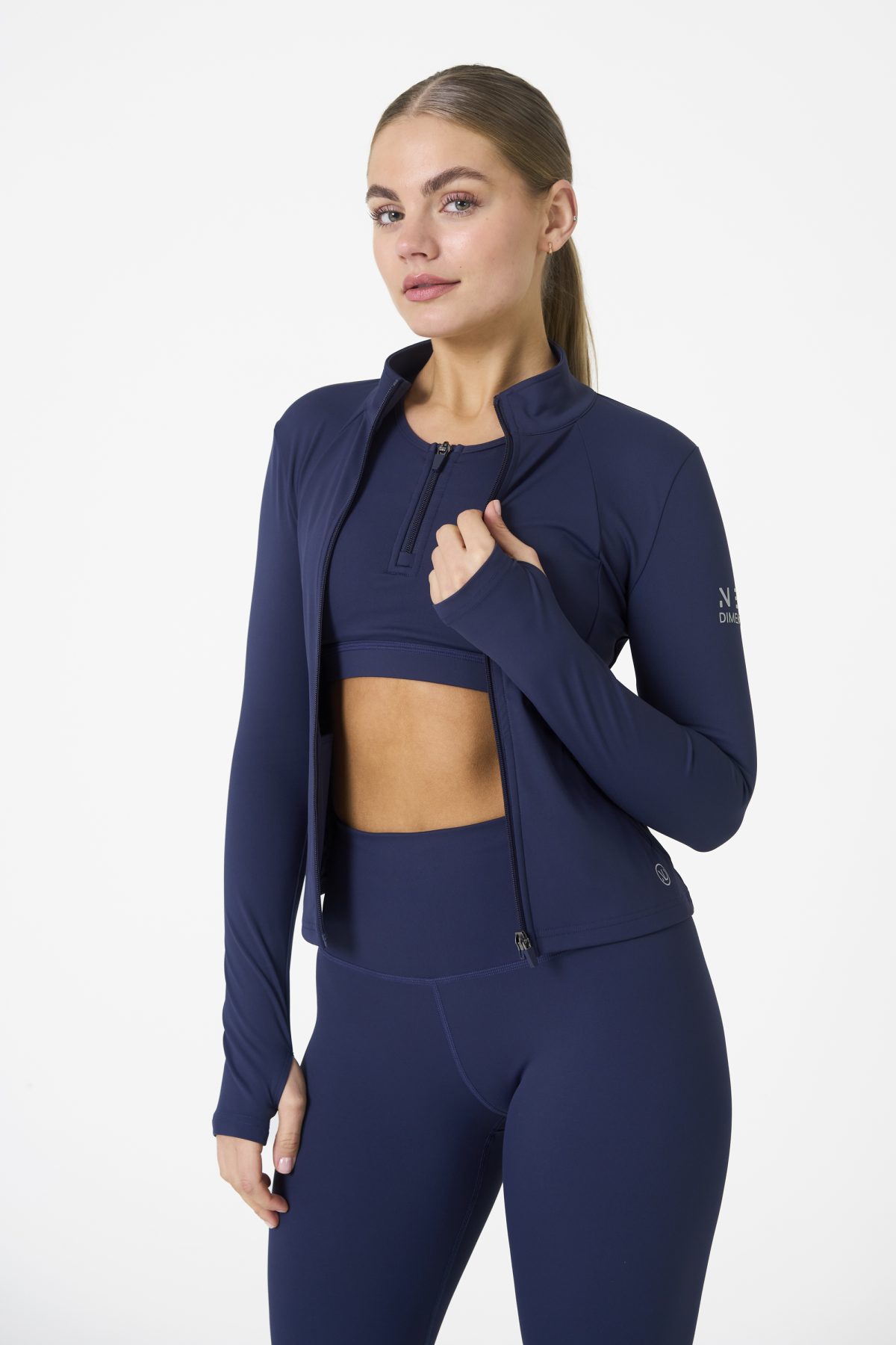 Elevate your activewear game with the Legacy Zip Jacket (Navy), designed for those who value movement, support, and unmatched comfort. Crafted from a premium blend of 75% Nylon and 25% Spandex, this jacket offers a lightweight yet durable feel that keeps you supported during any activity.