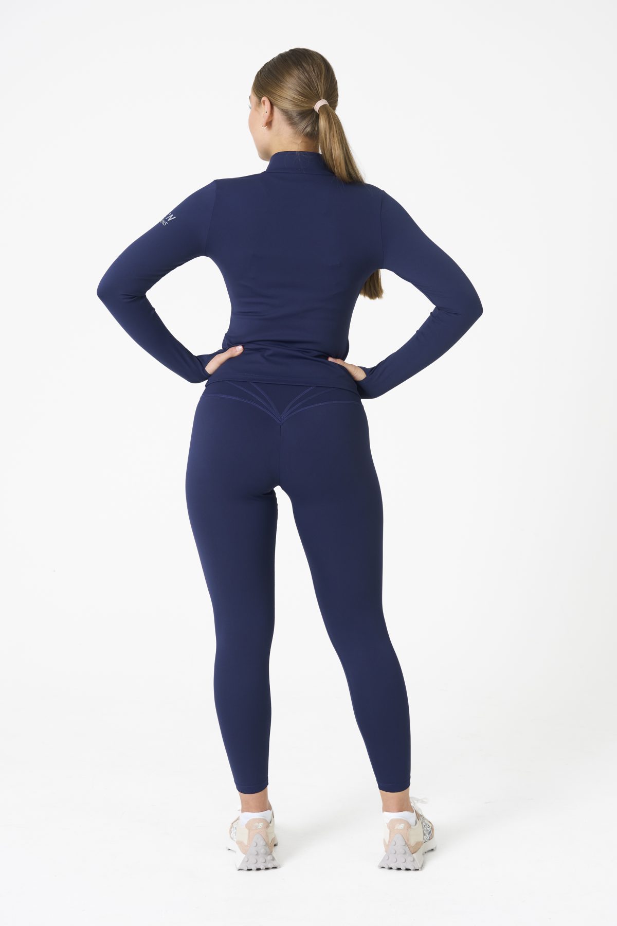 Elevate your workout wardrobe with the Legacy Legging (Navy), designed to empower every movement. Part of our Legacy Activewear Collection, these leggings combine superior support, unmatched comfort, and timeless style. Featuring a high-waisted fit with a flat-line drawstring for adjustable comfort, these leggings are crafted to stay put through every squat, lunge, and stretch. The back-enhanced detail adds a flattering finish, making these leggings a staple for both gym sessions and casual wear.